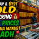 Comparing 22K gold prices and jewelry designs at Batha Gold Market in Riyadh.
